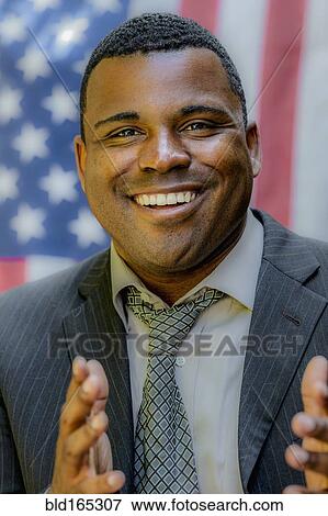 Close up of Black politician smiling View Large Photo Image Stock Photo - Close up of Black politician smiling. Fotosearch