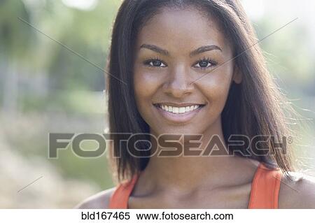 Stock Photography - Close up of Black woman smiling. Fotosearch