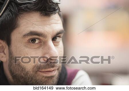 Stock Photo - Close up of calm Caucasian man. Fotosearch