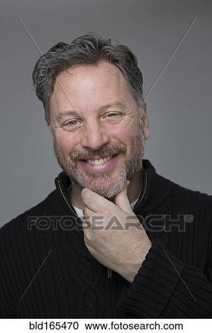 Close up of Caucasian man scratching his chin View Large Photo Image Stock Image - Close up of Caucasian man scratching his chin. Fotosearch