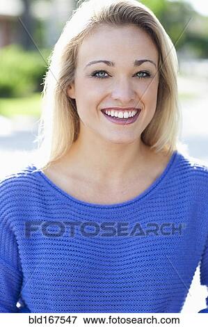 Close up of Caucasian woman smiling outdoors View Large Photo Image Stock Photo - Close up of Caucasian woman smiling outdoors. Fotosearch