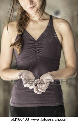 Close up of chalky hands of athlete in gym View Large Photo Image Stock Image - Close up of chalky hands of athlete in gym. Fotosearch