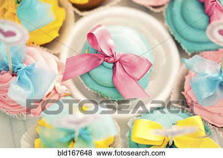 Close up of decorated cupcakes View Large Photo Image Stock Photo - Close up of decorated cupcakes. Fotosearch