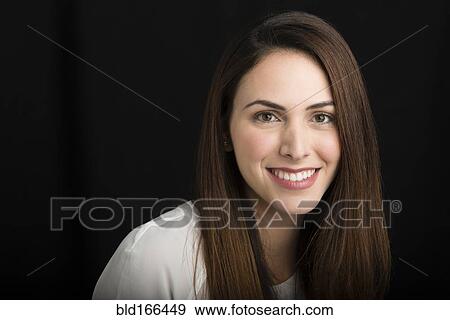 Close up of Hispanic woman smiling View Large Photo Image Stock Photo - Close up of Hispanic woman smiling. Fotosearch