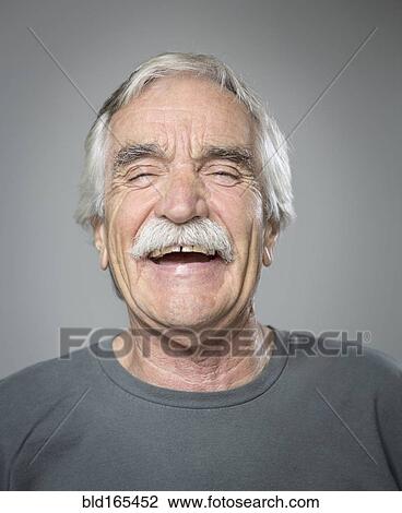Stock Image - Close up of older Caucasian man laughing. Fotosearch