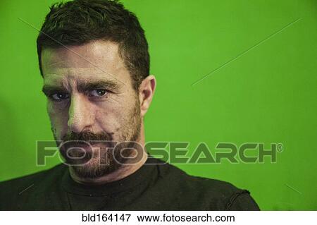 Stock Photo - Close up of serious Caucasian man. Fotosearch
