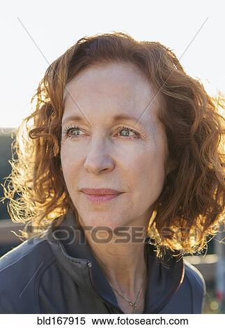 Stock Photography - Close up of serious Caucasian woman. Fotosearch