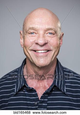 Stock Photo - Close up of smiling Caucasian man. Fotosearch