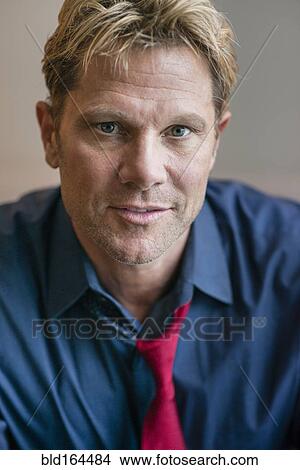 Close up of smiling Caucasian businessman View Large Photo Image Picture - Close up of smiling Caucasian businessman. Fotosearch