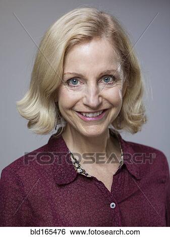 Stock Photograph - Close up of smiling Caucasian woman. Fotosearch