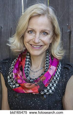 Stock Photography - Close up of smiling Caucasian woman. Fotosearch