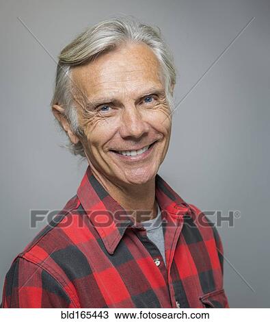 Stock Image - Close up of smiling older Caucasian man. Fotosearch