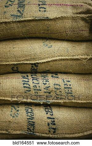 Close up of stack of burlap sacks View Large Photo Image Stock Image - Close up of stack of burlap sacks. Fotosearch