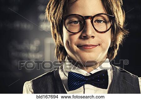 Picture - Close up of student wearing bow tie and eyeglasses. Fotosearch