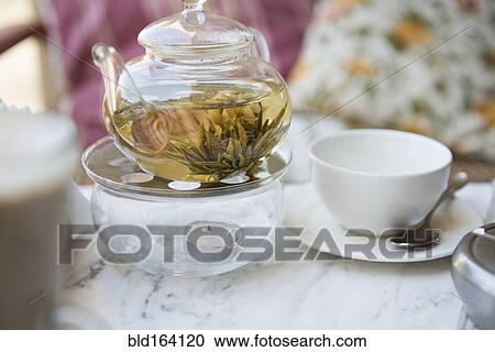 Close up of tea steeping in teapot View Large Photo Image Stock Image - Close up of tea steeping in teapot. Fotosearch