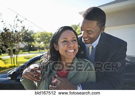 Couple hugging near convertible View Large Photo Image Stock Image - Couple hugging near convertible. Fotosearch