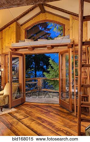 Doorway and loft of wooden tree house View Large Photo Image Stock Photography - Doorway and loft of wooden tree house. Fotosearch