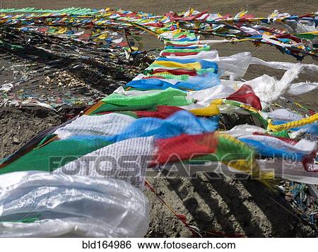 High angle view of prayer flags in wind on remote hillside View Large Photo Image Stock Photograph - High angle view of prayer flags in wind on remote hillside. Fotosearch