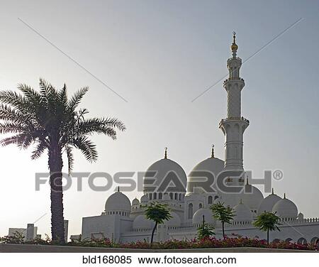 Stock Photography - High rise buildings and street, Abu Dhabi Emirate, United Arab Emirates. Fotosearch