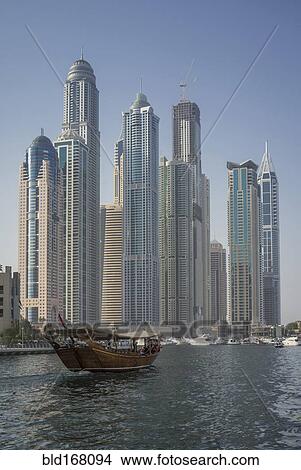 Picture - High rise buildings in city skyline, Dubai Emirate, United Arab Emirates. Fotosearch