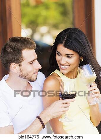 Hispanic couple drinking wine View Large Photo Image Stock Photograph - Hispanic couple drinking wine. Fotosearch