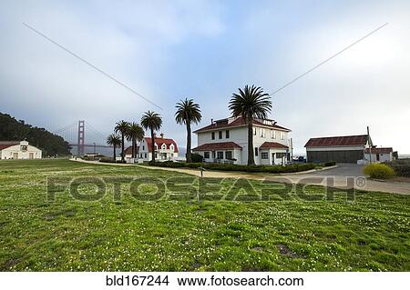 Picture - Houses and grass field near Golden Gate Bridge, San Francisco, California, United States. Fotosearch
