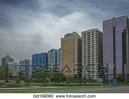Stock Image - Illuminated domes on ornate building, Abu Dhabi, Abu Dhabi Emirate, United Arab Emirates. Fotosearch