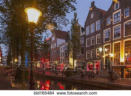 Illuminated streetlights on Amsterdam canal street, Netherland View Large Photo Image Picture - Illuminated streetlights on Amsterdam canal street, Netherland. Fotosearch