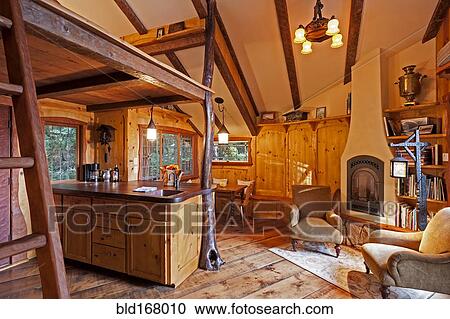 Kitchen and loft in wooden tree house View Large Photo Image Stock Image - Kitchen and loft in wooden tree house. Fotosearch