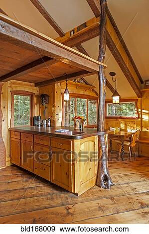 Kitchen and loft in wooden tree house View Large Photo Image Stock Photo - Kitchen and loft in wooden tree house. Fotosearch