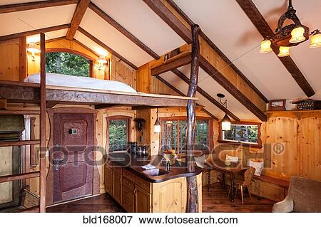 Loft bedroom in wooden tree house View Large Photo Image Stock Photo - Loft bedroom in wooden tree house. Fotosearch