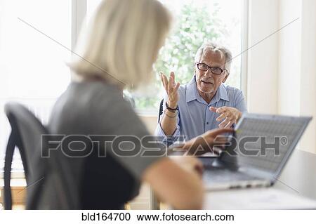 Older Caucasian business people arguing in office meeting View Large Photo Image Stock Image - Older Caucasian business people arguing in office meeting. Fotosearch