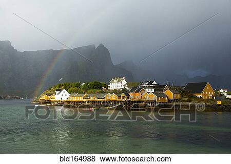 Rainbow over buildings in Sacrisoy, Lofoten Islands, Norway View Large Photo Image Stock Photo - Rainbow over buildings in Sacrisoy, Lofoten Islands, Norway. Fotosearch