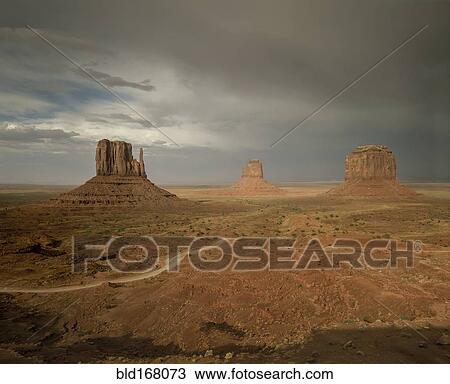 Rock formations in desert landscape, Monument Valley, Arizona, United States View Large Photo Image Stock Image - Rock formations in desert landscape, Monument Valley, Arizona, United States. Fotosearch
