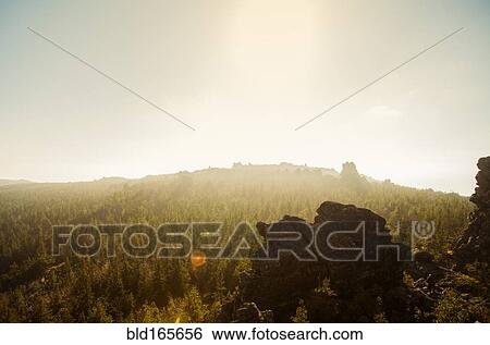 Stock Photograph - Rock formations on remote mountain. Fotosearch