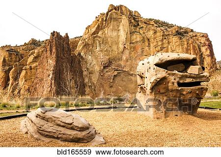 Stock Photo - Rock formations under sheer cliffs, Smith Rock State Park, Oregon, United States. Fotosearch