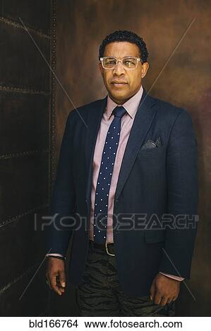 Picture - Serious Mixed race businessman. Fotosearch
