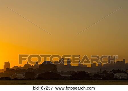 Stock Photo - Silhouette of San Francisco city skyline at sunrise, California, United States. Fotosearch