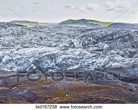 Snow on remote rock formations, Myrdalsjokull Glacier, South Iceland, Iceland View Large Photo Image Stock Photo - Snow on remote rock formations, Myrdalsjokull Glacier, South Iceland, Iceland. Fotosearch