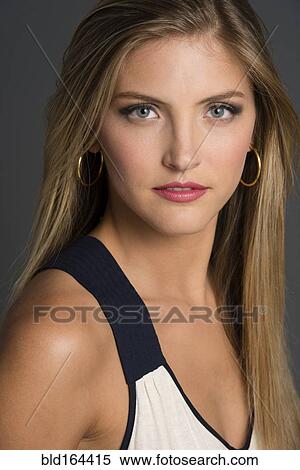 Stock Photography - Stylish Caucasian woman with serious face. Fotosearch
