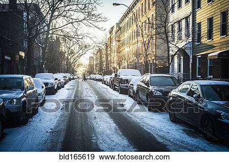 Tire tracks in snow on city street, New York, New York, United States View Large Photo Image Stock Photo - Tire tracks in snow on city street, New York, New York, United States. Fotosearch