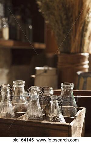 Vintage glass bottles in wooden crates View Large Photo Image Stock Photography - Vintage glass bottles in wooden crates. Fotosearch