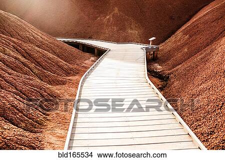 Wooden walkway in desert hills View Large Photo Image Picture - Wooden walkway in desert hills. Fotosearch