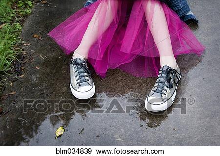 Caucasian girl wearing sneakers and tutu in puddle View Large Photo Image Stock Photo - Caucasian girl wearing sneakers and tutu in puddle. Fotosearch