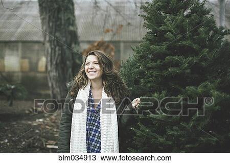 Caucasian woman walking in park View Large Photo Image Stock Image - Caucasian woman walking in park. Fotosearch