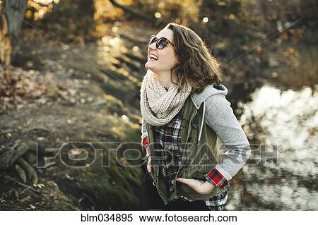 Caucasian woman walking in park View Large Photo Image Stock Photography - Caucasian woman walking in park. Fotosearch