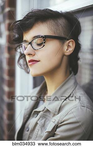 Stock Image - Close up of Caucasian woman with eyes closed. Fotosearch