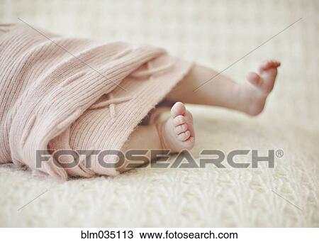 Close up of feet of newborn baby girl View Large Photo Image Stock Image - Close up of feet of newborn baby girl. Fotosearch