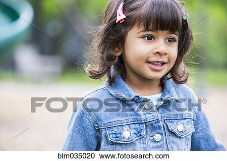 Close up of girl walking at playground View Large Photo Image Stock Image - Close up of girl walking at playground. Fotosearch