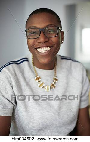 Stock Image - Close up of mixed race woman smiling. Fotosearch
